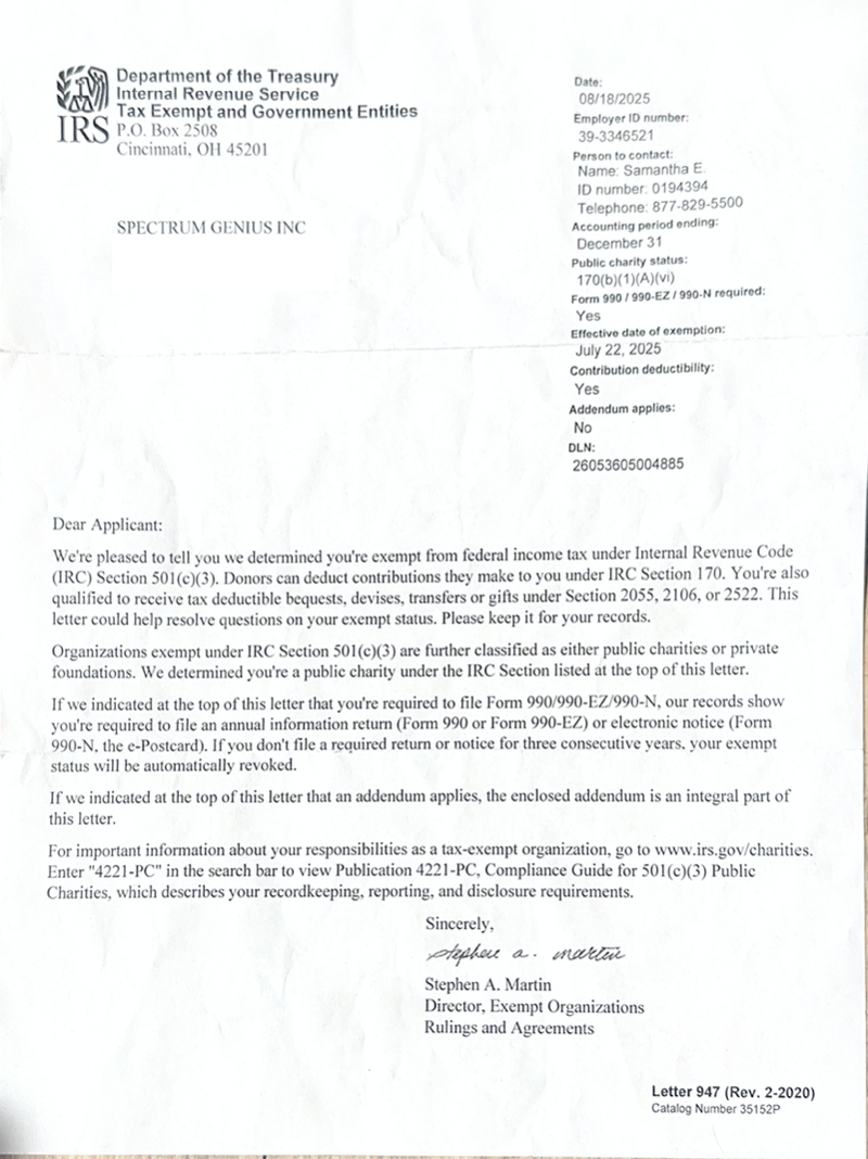 IRS determination letter recognising Spectrum Genius Inc. as a 501(c)(3) tax-exempt organisation.